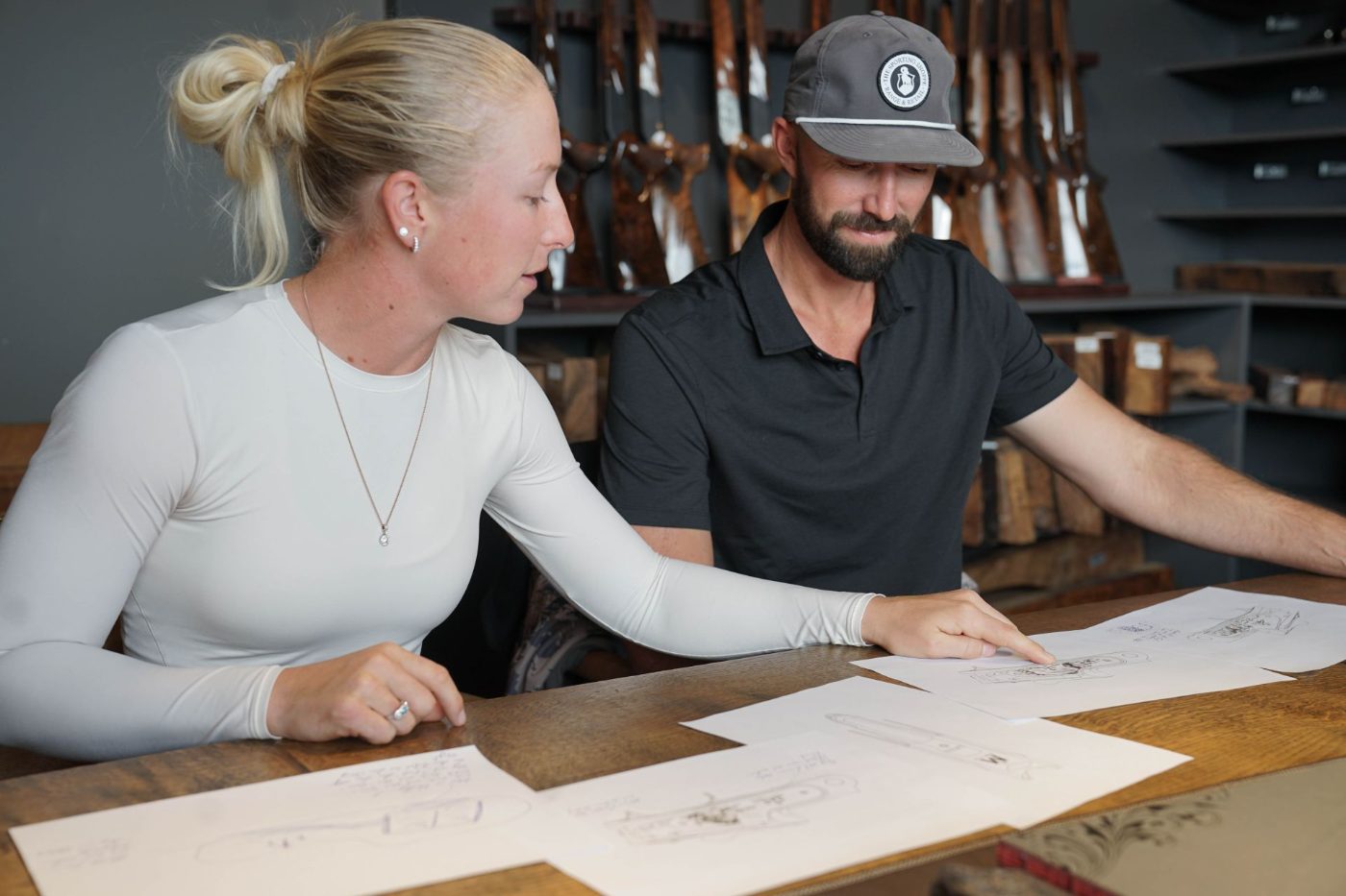 Karen and Gebben Miles reviewing Miles Edition engraving drawings