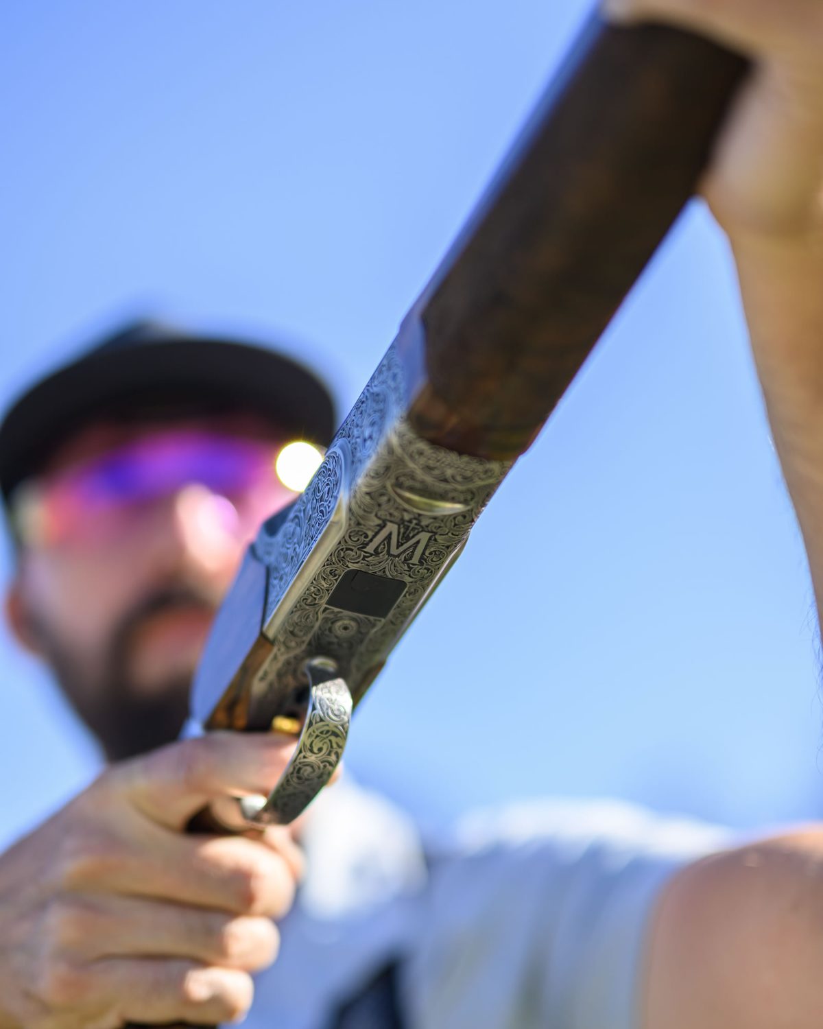Shooter mounting the engraved Miles Edition FBX, M emblem on the receiver