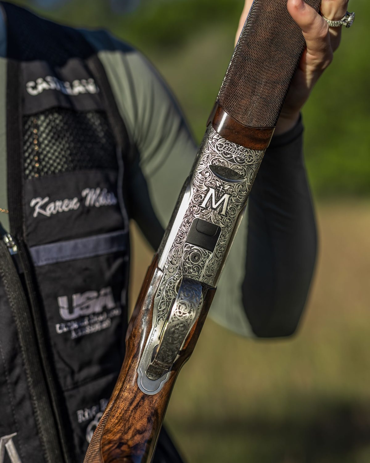 Karen Miles holding her engraved Miles Edition FBX